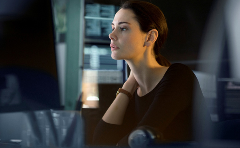 Image of a woman looking at a computer