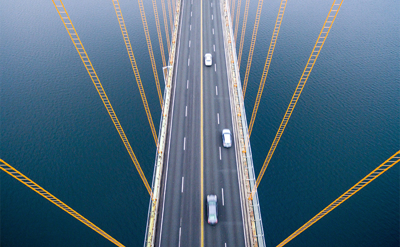 Image of a car crossing a bridge